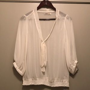 Never worn classy sheer blouse